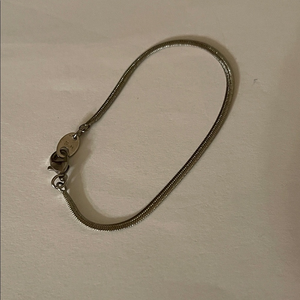 Silver tone metal bracelet